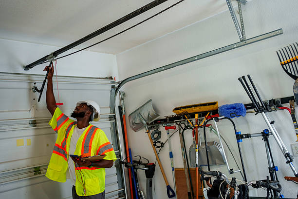 Professional Garage Door Roller Replacement technician working in Troy, MI